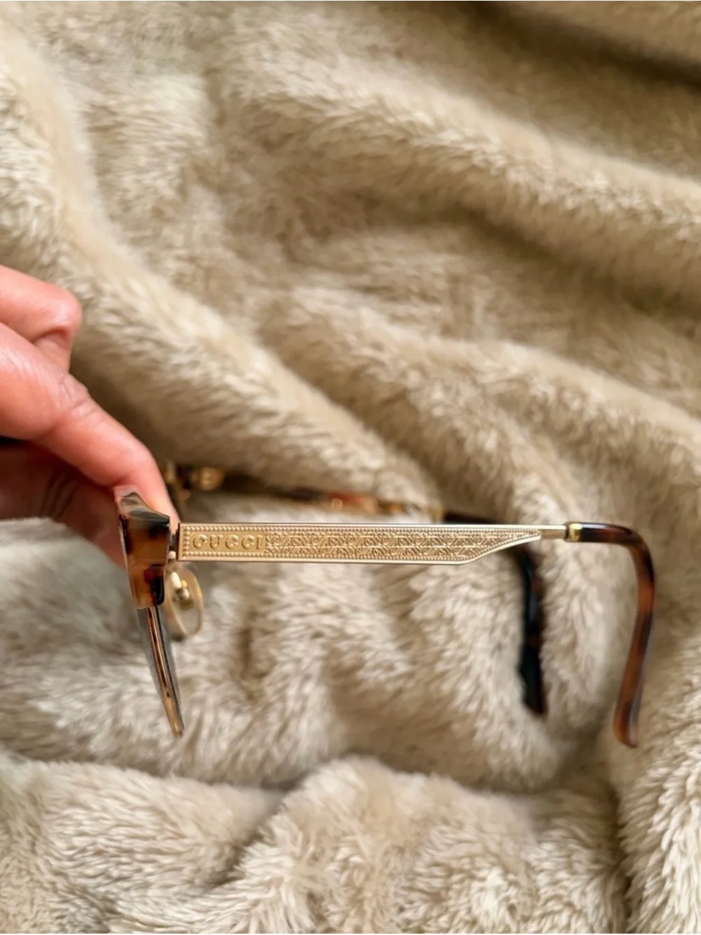 Gucci Tortoiseshell Sunglasses with Gold Accents and Dark Lenses